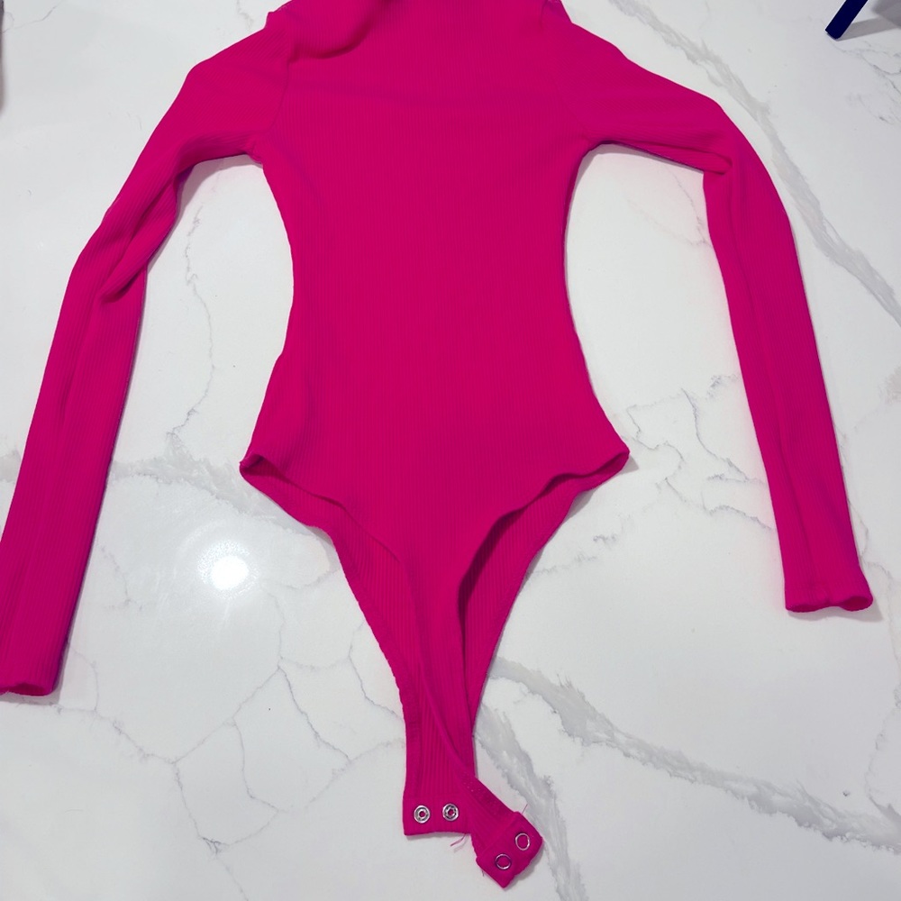 Naked wardrobe brand new size small bodysuit